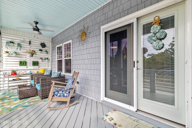 wooden terrace with ceiling fan