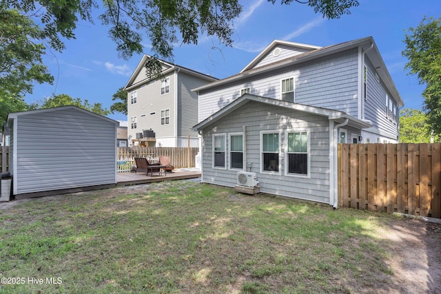 910 Old Dow Rd, Carolina Beach, NC 28428 - back of property featuring a wooden deck, a cooling unit, and an outdoor structure