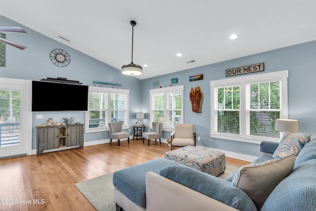 910 Old Dow Rd, Carolina Beach, NC 28428 - living room with light wood-type flooring, recessed lighting, baseboards, a ceiling fan, and high vaulted ceiling