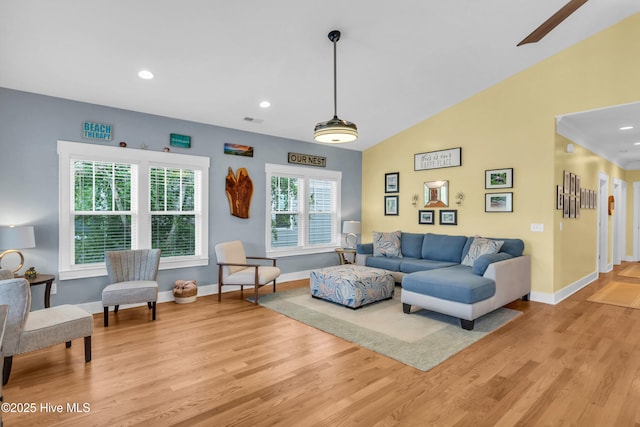 910 Old Dow Rd, Carolina Beach, NC 28428 - living room featuring light wood-style flooring, baseboards, recessed lighting, a ceiling fan, and lofted ceiling