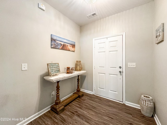 entrance foyer featuring dark wood-type flooring