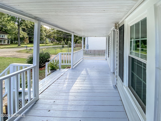 wooden terrace with covered porch