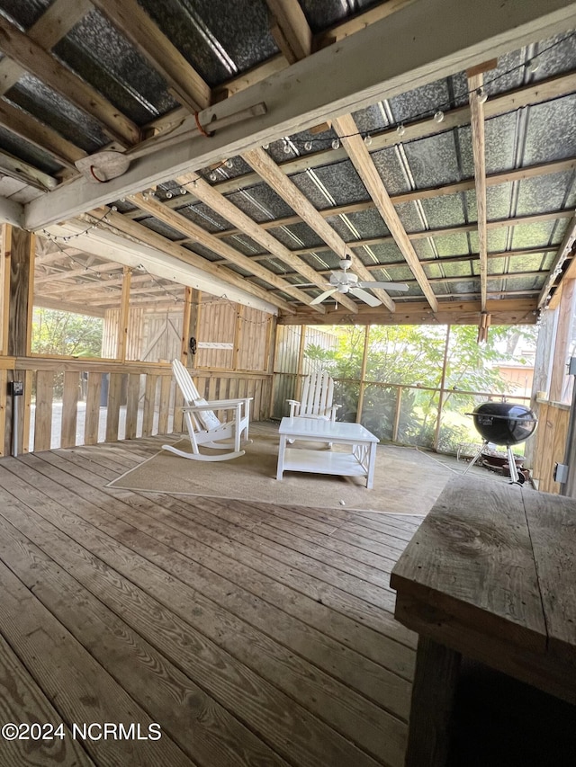 wooden deck featuring grilling area