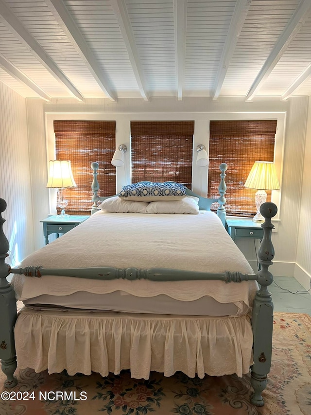 bedroom featuring beam ceiling