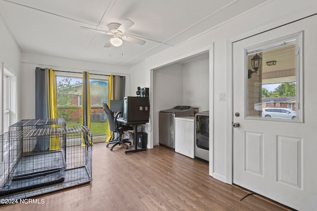 office area with wood-type flooring, washer and dryer, and ceiling fan