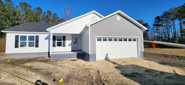 view of front of property featuring a garage