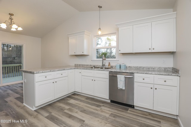 kitchen with dishwasher, a peninsula, light wood-type flooring, white cabinetry, and a sink