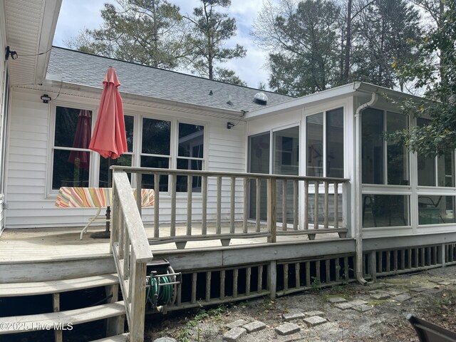 surrounding community featuring a boat dock and a water view