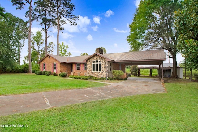 ranch-style house with a carport and a front yard