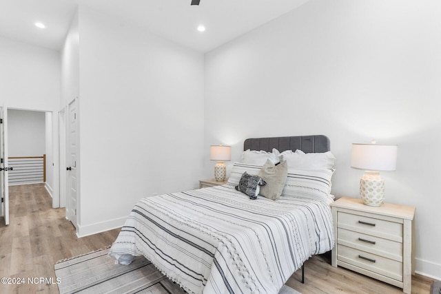 bedroom with light hardwood / wood-style floors