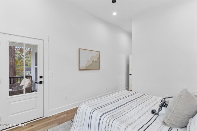 bedroom with light wood-type flooring and ceiling fan