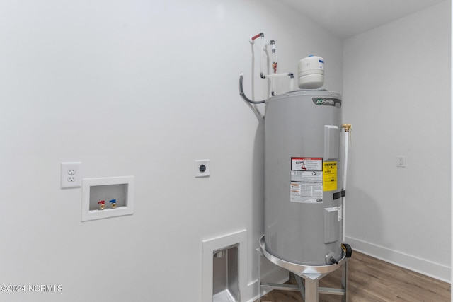 utility room featuring water heater