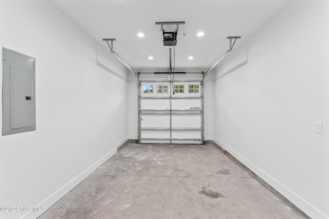 garage featuring a garage door opener and electric panel