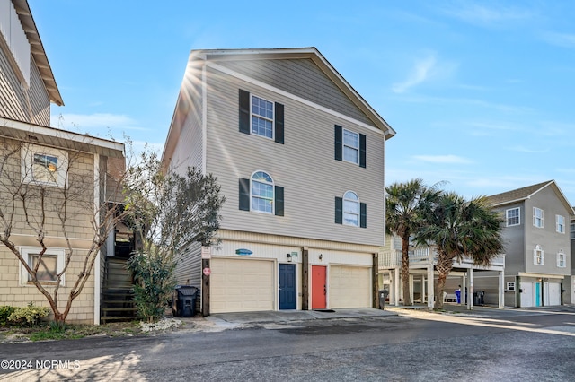 front of property with a garage