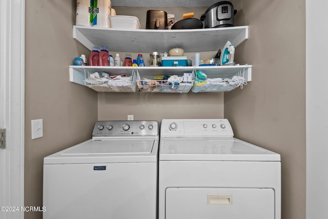 laundry area featuring independent washer and dryer