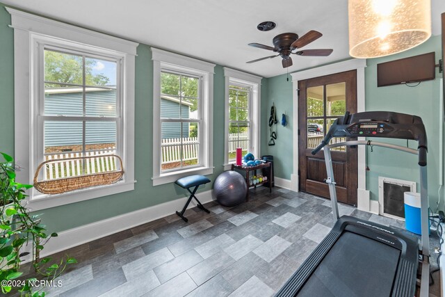 306 4th St, Pollocksville, NC 28573 - workout area with baseboards and a ceiling fan