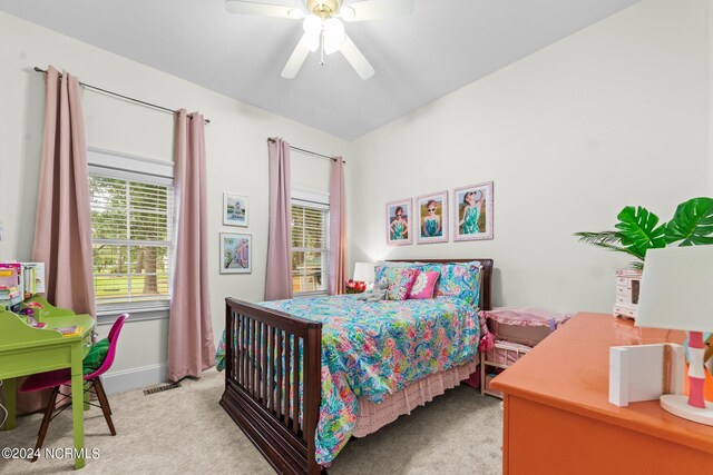 306 4th St, Pollocksville, NC 28573 - carpeted bedroom with a ceiling fan, baseboards, and visible vents