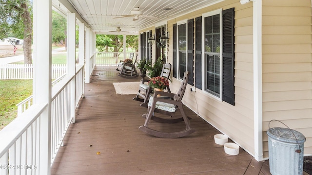 306 4th St, Pollocksville, NC 28573 - wooden deck with fence, covered porch, and ceiling fan