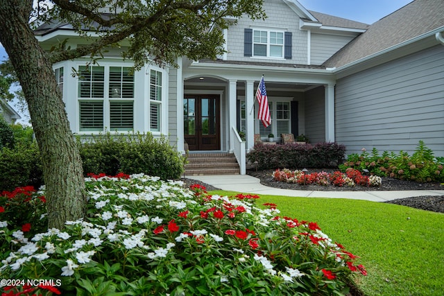 entrance to property featuring french doors