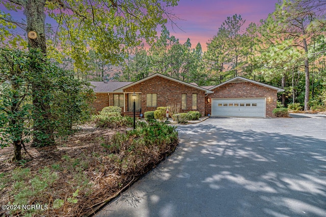 ranch-style house with a garage