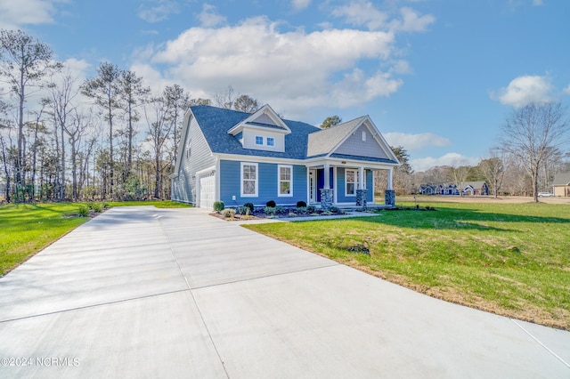 new england style home featuring a porch and a front yard