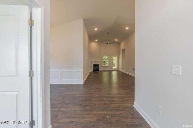 79 Fishing Creek Dr, New Bern, NC 28562 - corridor featuring a decorative wall, vaulted ceiling, recessed lighting, dark wood-style flooring, and wainscoting