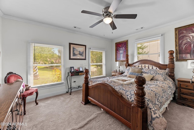 bedroom with light carpet, ceiling fan, and crown molding