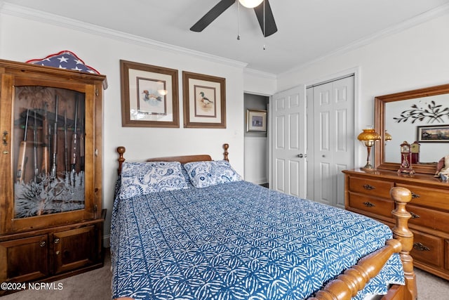 bedroom with a closet, carpet, ceiling fan, and crown molding