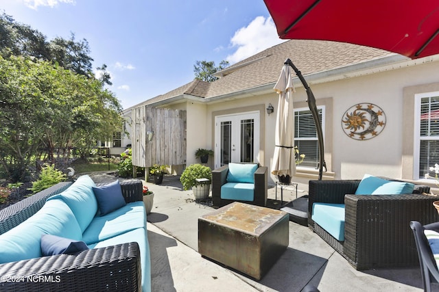 view of patio / terrace featuring french doors and an outdoor living space