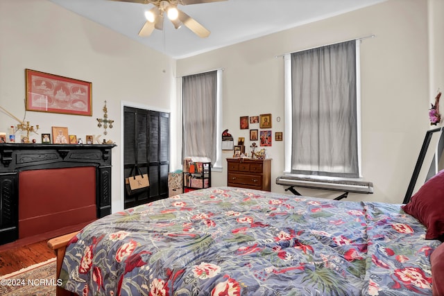 bedroom featuring hardwood / wood-style floors and ceiling fan