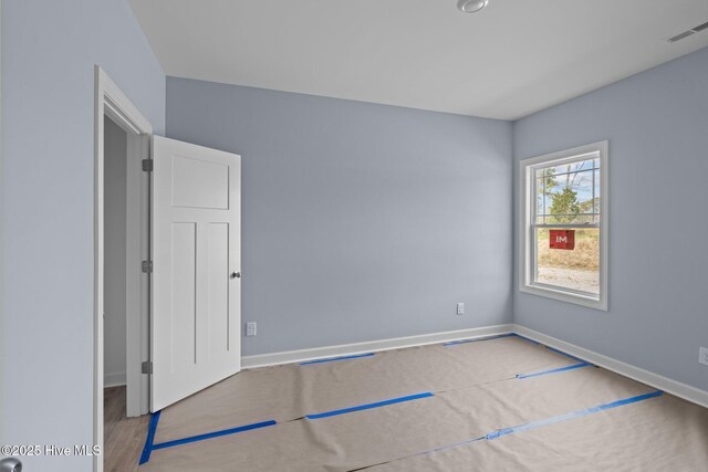308 Camp Creek Dr, Oriental, NC 28571 - spare room with baseboards and visible vents