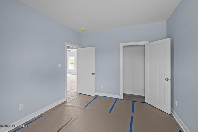 308 Camp Creek Dr, Oriental, NC 28571 - unfurnished bedroom with a closet and baseboards