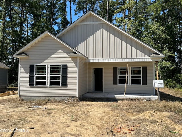 view of front facade with a patio area