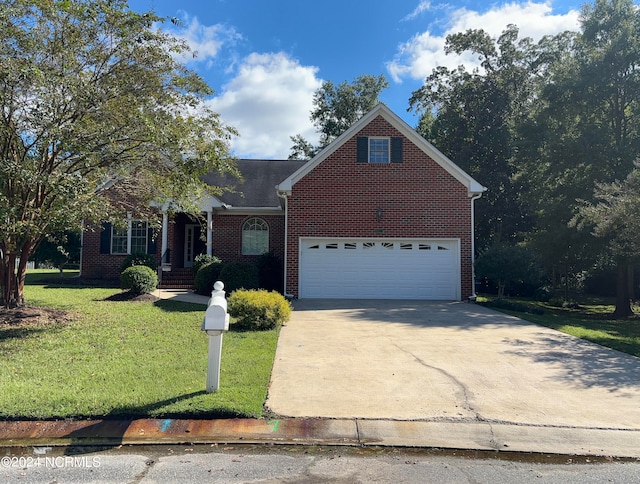 front facade featuring a garage and a front yard