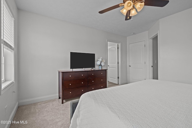 118 High Tower Ln, Aberdeen, NC 28315 - bedroom with baseboards, carpet flooring, and a ceiling fan