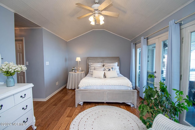 bedroom with light wood-type flooring, crown molding, lofted ceiling, ceiling fan, and french doors