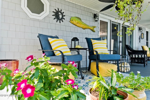 view of patio featuring ceiling fan