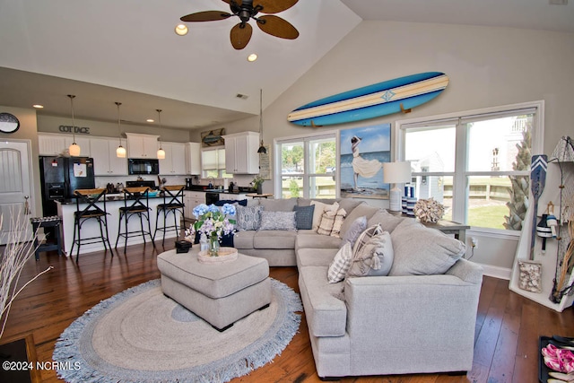 living room with high vaulted ceiling, ceiling fan, and dark hardwood / wood-style flooring