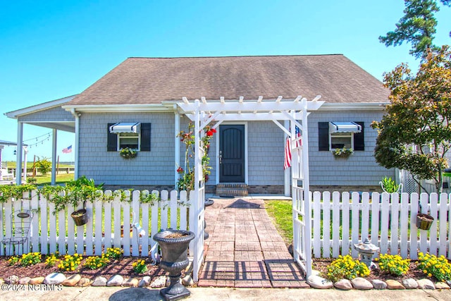 view of front of house featuring a pergola