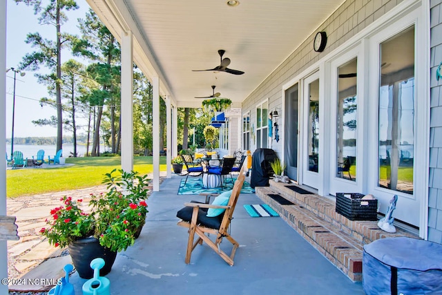 view of patio featuring a porch and ceiling fan