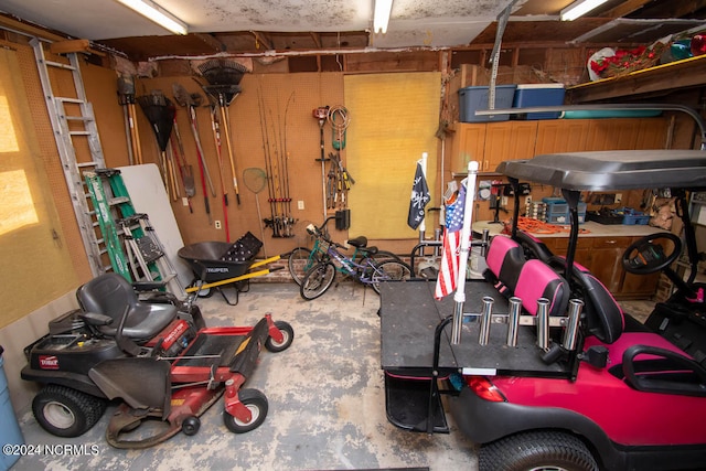 garage with a workshop area