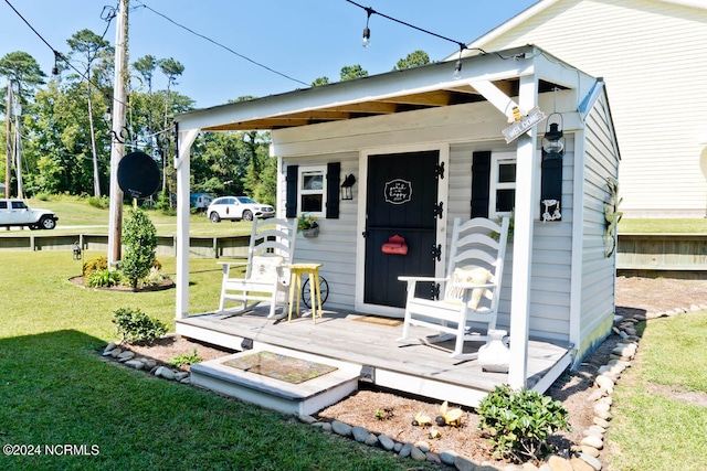 view of outdoor structure with a yard