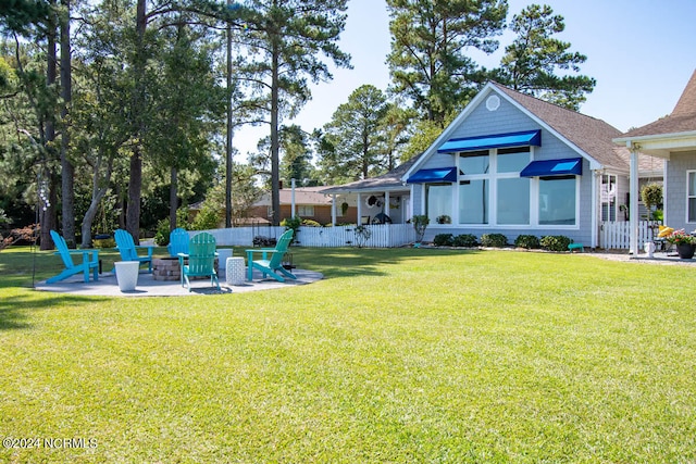 view of yard with a patio area and a fire pit