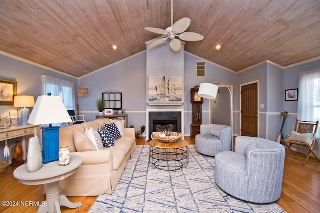 living room featuring wood ceiling, light wood-type flooring, lofted ceiling, and ceiling fan