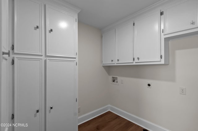 laundry area with hookup for a washing machine, hookup for an electric dryer, dark wood-type flooring, and cabinets