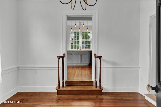 stairway featuring hardwood / wood-style floors