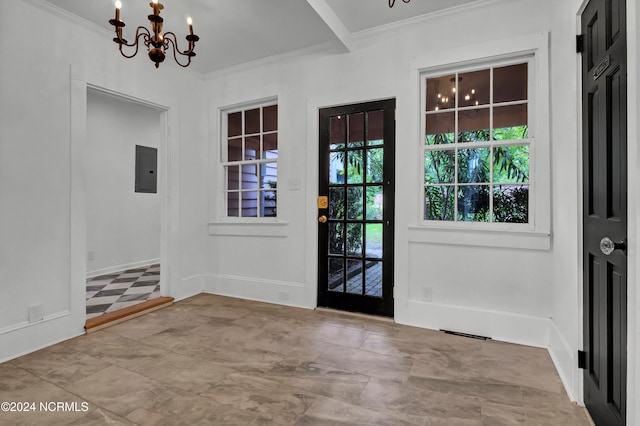 doorway with ornamental molding, electric panel, and an inviting chandelier