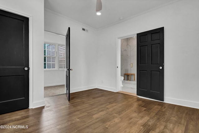 interior space with ceiling fan, hardwood / wood-style flooring, and ornamental molding