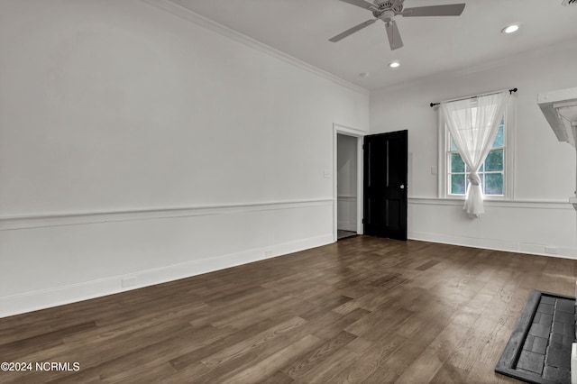 unfurnished room with ornamental molding, wood-type flooring, and ceiling fan