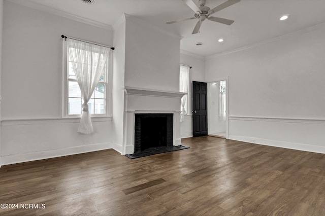 unfurnished living room with ceiling fan, crown molding, and dark hardwood / wood-style floors